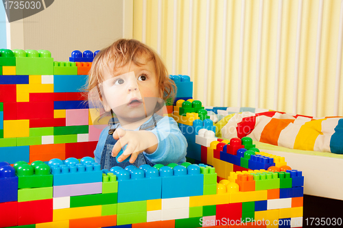 Image of Kid playing construction