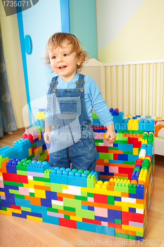 Image of Kid playing with toy blocs