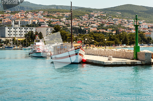 Image of two cruise boats on pier