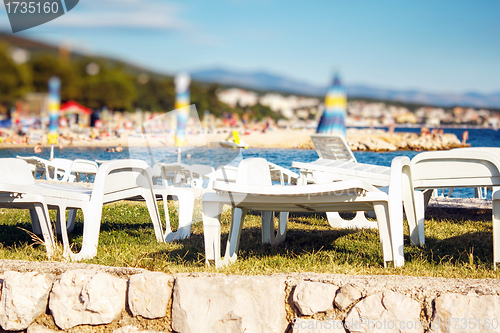 Image of plastic Sun loungers at beach