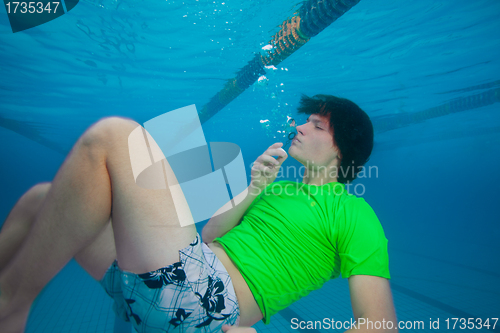 Image of Blowing bubbles underwater