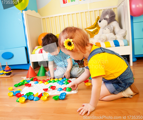 Image of Girls playing with puzzle