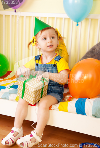 Image of Little girl with present