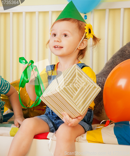 Image of Birthday. Opeening the present