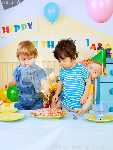 Image of Kids and birthday cake
