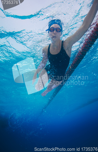 Image of sportsman swimming in crawl style