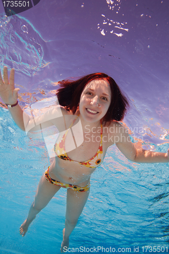 Image of Really happy young woman swimmer