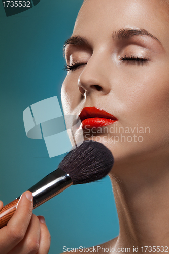 Image of Professional makeup artist working