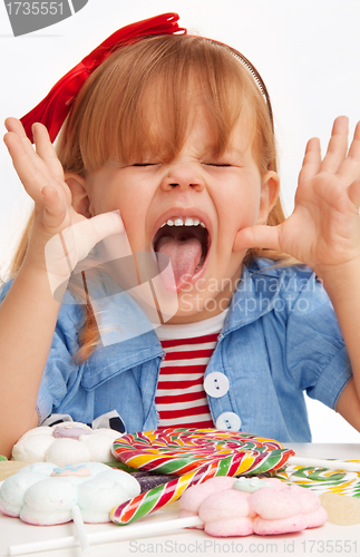 Image of Little girl teasing