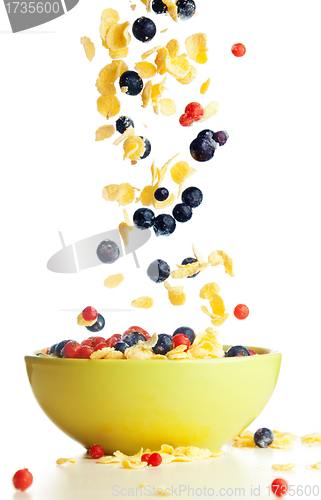 Image of Flying to the bowl corn flakes with berries