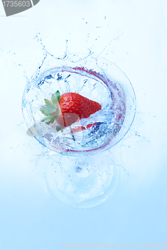 Image of Fresh strawberry splash in glass