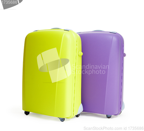 Image of two suitcases on white