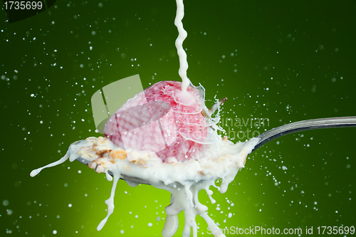 Image of Spoon, milk, strawberry, splash