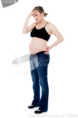 Image of Pregnant woman having headache