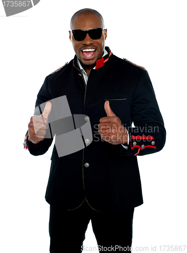 Image of Handsome excited african with double thumbs-up