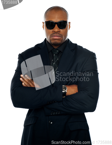 Image of Serious african man in business suit