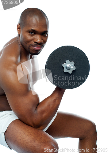 Image of Portrait of happy fit african man working out