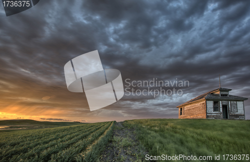 Image of Old School house and sunset