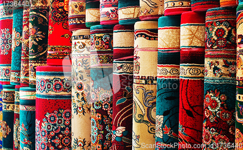 Image of Persian blankets at a market