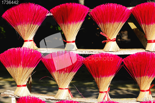 Image of Red incense or joss sticks for buddhist prayers