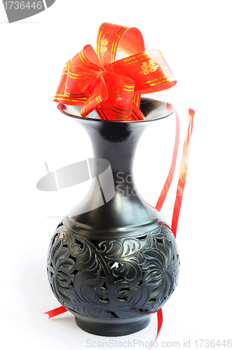 Image of Black vase with red auspicious knot