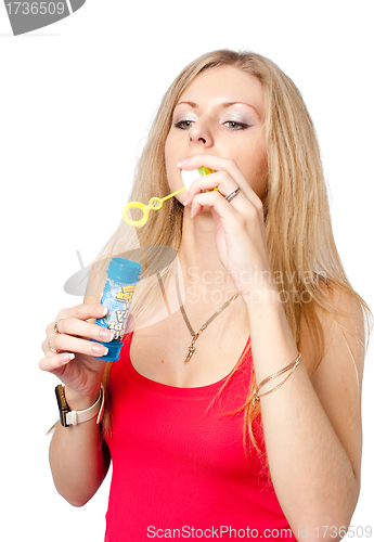 Image of Pretty girl with soap bubbles