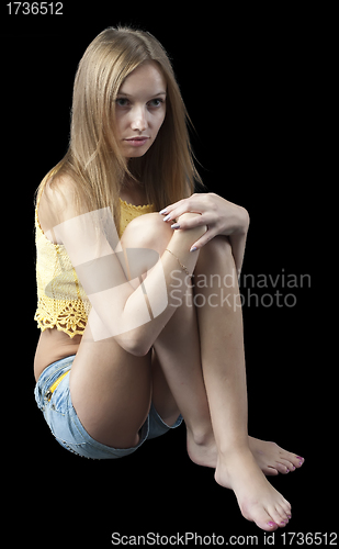 Image of Sitting pretty girl