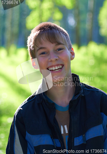 Image of Smiling boy on a green background