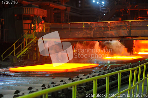 Image of hot steel on conveyor 