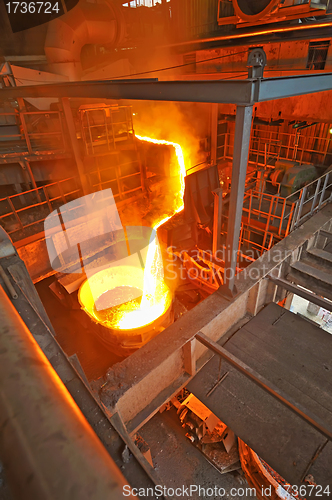 Image of pouring molten steel