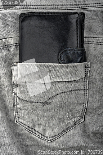 Image of old wallet in old jeans