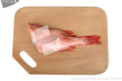 Image of grouper on a wooden cutting board