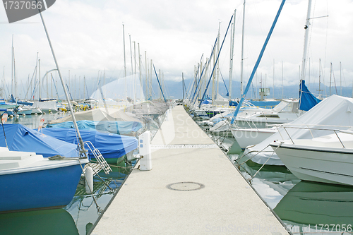 Image of yachts and boats in the harbor in Ouchy, Switzerland