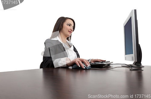Image of Young woman working on a computer