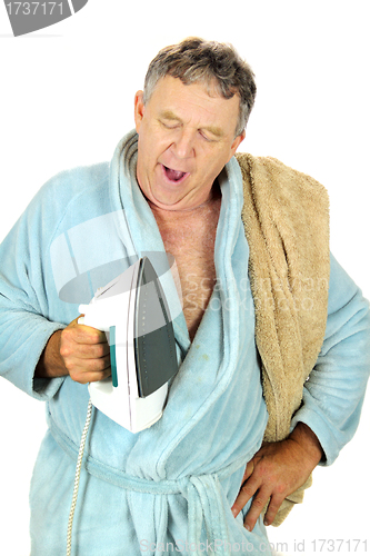 Image of Yawning Man With Iron