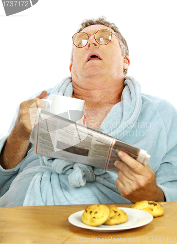 Image of Man Asleep At Breakfast