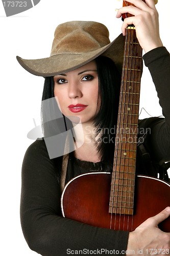 Image of Country woman with acoustic guitar
