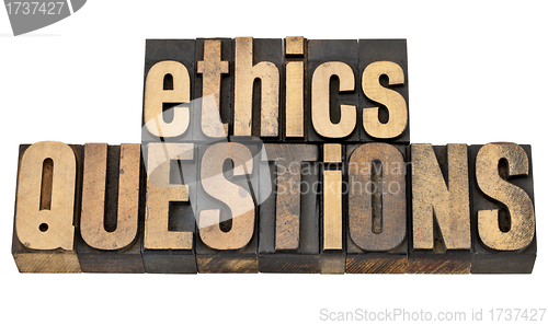 Image of ethics questions in wood type