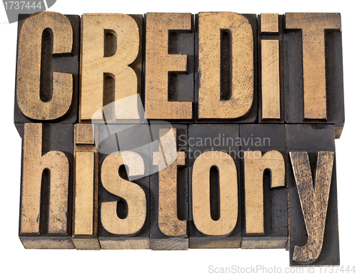 Image of credit history text in wood type