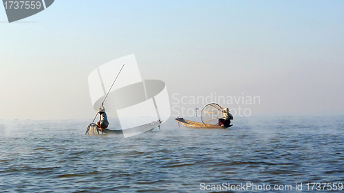 Image of Fishermen fishing in a lake in Myanmar