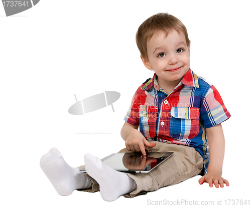 Image of A child with a tablet computer
