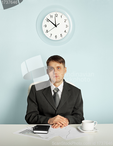 Image of Businessman waiting in an office at the workplace