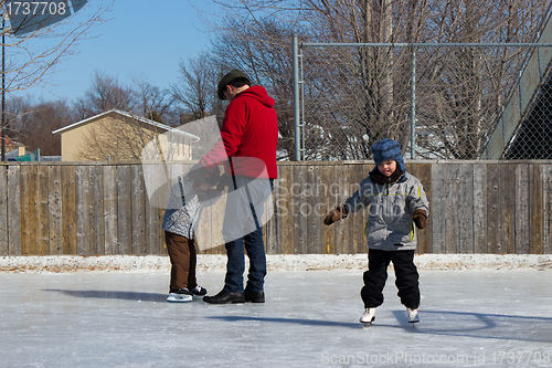 Image of Family at a skating rink