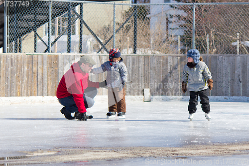 Image of Family having fun at the skating rink