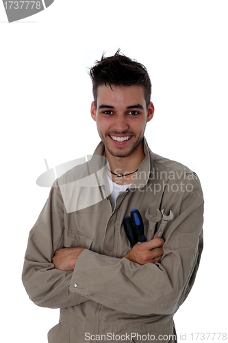 Image of Young smiling car mechanic