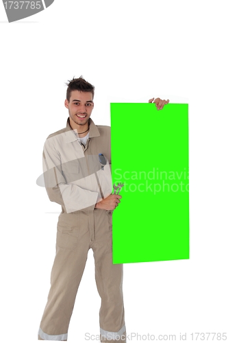 Image of Craftsman holding a blank green board