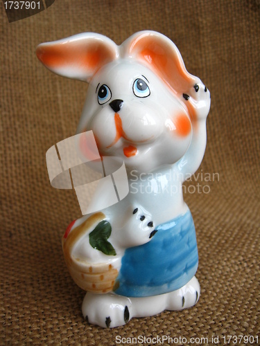 Image of Toy hare on a brown background