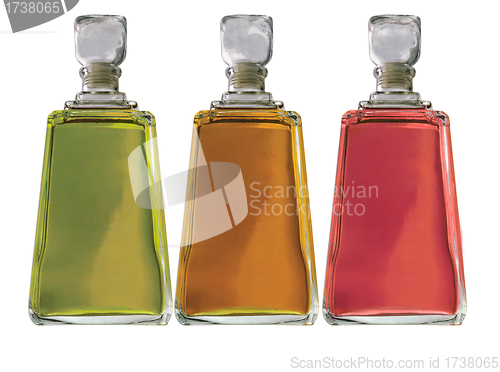 Image of three colors perfume bottles