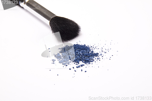 Image of Cosmetic powder and black brush isolated