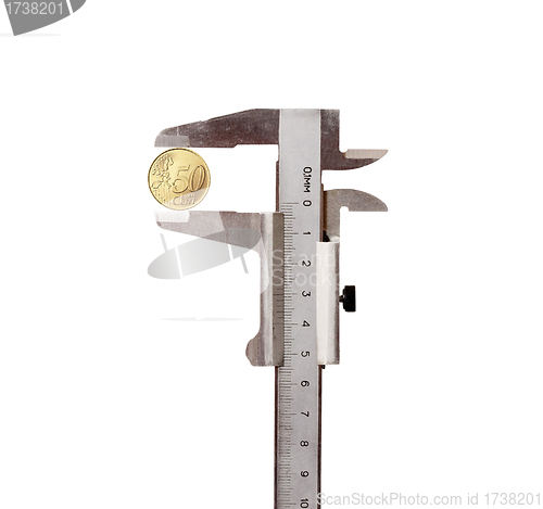 Image of Vernier calipers with coin isolated